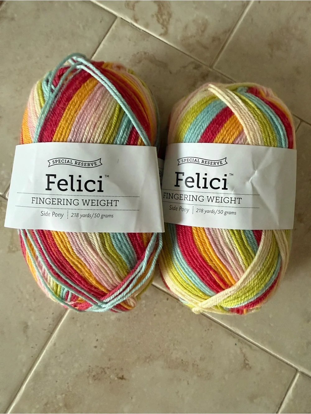 Felici Fingering Weight Yarn - Multicolor Pastel Stripes 2 Skeins Side Pony
